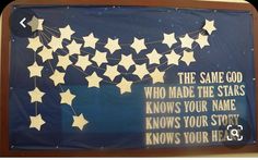 a blue sign with white stars hanging from it's sides that says the same god who made the stars know your name knows your story knows your heart knows your heart