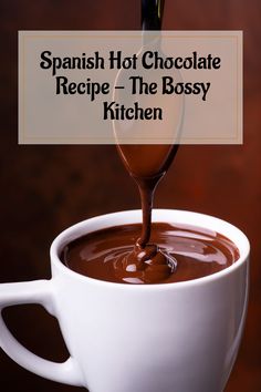 chocolate being poured into a white cup with the words spanish hot chocolate recipe - the bossy kitchen