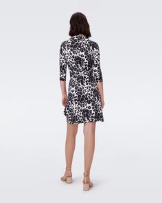 Cut from our signature silk jersey, this knee-length wrap dress has long sleeves, a V-neck collar, and a true wrap closure. Lightweight and anti-wrinkle, its fabric makes it the ultimate year-round travel companion. V-neck Belted Dress With Surplice Neckline, V-neck Floral Print Wrap Dress For Daywear, Wrap Dress Dvf, Chic V-neck Rayon Wrap Dress, Wrap Dress Diane Von Furstenberg, Jersey Wrap Dress, Silk Wrap Dresses, Diane Von Furstenberg Wrap Dress Dvf, Wrap Dress Floral