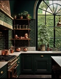 a kitchen with dark green cabinets and an arched window that overlooks the trees outside