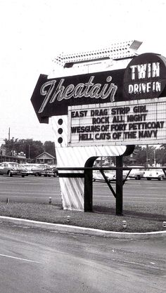 a large sign on the side of a road that says treadain drive - in