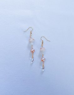 "Morning Dew on the Marsh Earrings 🍄🌷 Now available in silver or gold!  Part of the Hidden Garden Collection 2.5 inch dangle earrings  Made with lavender fresh water pearls, lampwork pink mushroom beads, iridescent teardrop glass beads; as well as anti tarnish wire & 18K gold plated or silver plated earring hooks. Also available in grey titanium or \"gold\" titanium hypoallergenic earring hooks! DM me on instagram about custom orders! Pearls & glass beads are delicate, please keep jewelry dry Iridescent Pearl Drop Dangle Earrings, Iridescent Pearl Drop Earrings, Pink Pearl Drop Chandelier Earrings, Pink Adjustable Pearl Drop Earrings, Adjustable Pink Pearl Drop Earrings, Dangle Crystal Earrings With Pearl Drop, Adjustable Teardrop Dangle Earrings With Pearl Drop, Adjustable Dangle Beaded Earrings With Pearl Drop, Adjustable Pearl Drop Dangle Beaded Earrings