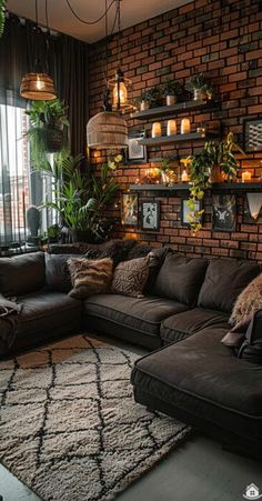 a living room filled with lots of furniture and plants on top of a brick wall