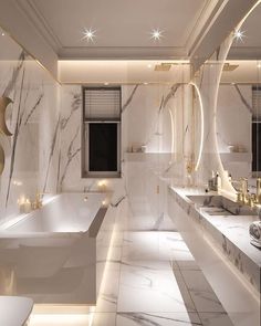 a large bathroom with marble walls and flooring