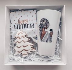 a cup and cookie in a gift box for someone's special birthday or other special occasion