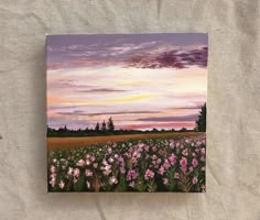 a painting of pink flowers in a field