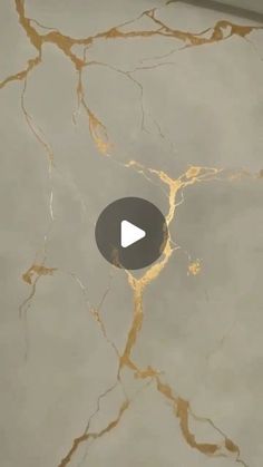 an image of a marble floor that looks like it has gold paint on it