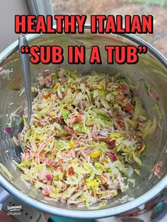 a metal bowl filled with shredded vegetables and text that reads healthy italian sub in a tub