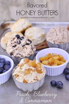 an assortment of honey butters, blueberries and muffins