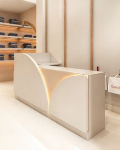 a white reception counter in a store