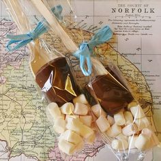 two bags of marshmallows on top of a map