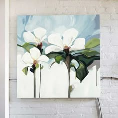 an abstract painting of white flowers on a brick wall