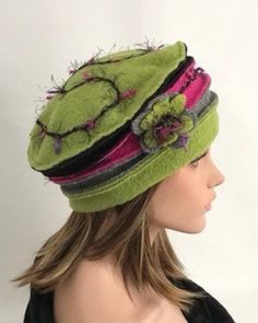 This boiled wool winter hat will be the ideal finish to your outfit. The hat is colored lime green, pink, gray and black. On the side of the hat a flower worked in wool, the background is embroidered in matching color wool. Size for head circumference 53-59 cm, stretchy, covers the ears well. Pleasant, soft and warm. It is possible to coordinate it with mittens and scarf. Dry clean or by hand in cold water. Green Winter Hat, Country Hats, Funky Hats, Woman Hat, Hat Fits, Wool Caps, Unique Hats, Dress Bohemian, Wool Winter