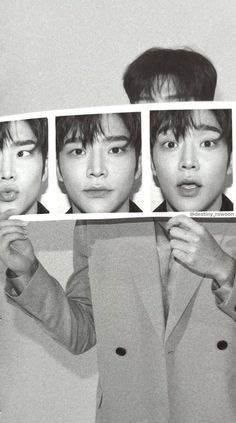 the four men are holding up pictures with their faces