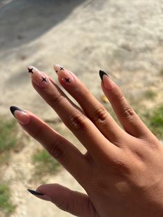 Cute Almond Nails Black, Black Star French Tip Nails, Black With Stars Nails, Black Star Almond Nails, Fall Nails 2023 Almond French Tip, Black French Tip Nails With Star, Black Tips With Chrome, Black French Tip Nail Art, Black White Star Nails