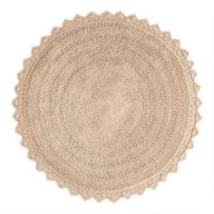 an oval rug with scalloped edges is shown on a white background in the shape of a circle