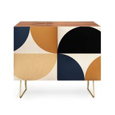 an art deco sideboard with geometric shapes on the front and sides, in various colors