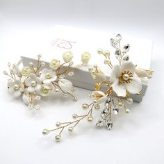 Bridal pearl and rhinestone leaf ceramic flower hair clip. Wedding bejeweled alligator hairclip floral hair accessory.Lightweight and elegant, this beautiful wedding theme hair clip integrates seamlessly into any hairdo. You can wear it with a high or low bun, or simply place it on the side for more casual yet romantic bridal look. Hand-wired branches, which are designed to resemble a tree branch covered with early spring blossoms, can be easily bent according to your style and desire. Delicate Fairy Creatures, Crystal Headpiece Wedding, Hair Clip Wedding, Pearl Bridesmaid Jewelry, Beach Jewelry Boho, Bridal Jewelry Necklace, Wedding Barrettes, Floral Composition, Floral Accessories Hair