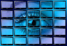 an image of multiple televisions with blue eyes