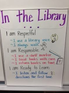 a sign with writing on it that says in the library