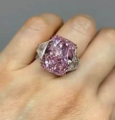 Radiant Cut pink  Moissanite Ring, Side Trapezoid Moissanite, Three Stone Engagement Ring, Claw Prongs, Wedding Ring, Bride Ring Welcome To My Shop, Great to Know You All Here. 💍 𝐑𝐢𝐧𝐠 𝐃𝐞𝐭𝐚𝐢𝐥𝐬  ��🔹 𝐌𝐞𝐭𝐚𝐥 𝐎𝐩𝐭𝐢𝐨𝐧𝐬:925 Sterling Silver 10 Carat/14 Carat/18 Carat Gold (Can be made in yellow/rose/white gold) 🔹 𝐒𝐭𝐨𝐧𝐞 𝐂𝐡𝐨𝐢𝐜𝐞: Moissanite  🔹 𝐒𝐭𝐨𝐧𝐞 𝐒𝐡𝐚𝐩𝐞: Radiant  🔹 𝐒𝐭𝐨𝐧𝐞 𝐒𝐢𝐳𝐞: 6 CT 🔹 𝐁𝐚𝐧𝐝 𝐒𝐡𝐚𝐧𝐤 𝐏𝐫𝐨𝐟𝐢𝐥𝐞: Designer  🔹 𝐁𝐚𝐧𝐝 𝐖𝐢𝐝𝐭? Wedding Ring Bride, Pink Moissanite Ring, Radiant Cut Moissanite Ring, Ring Bride, Bride Ring, Radiant Cut Rings, Radiant Engagement Rings, Three Stone Engagement Ring, Claw Prong