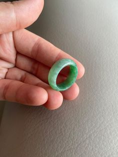 🌈 US 7 3/4 Jadeite Jade Ring, Light Green 🌷 Untreated Natural Jadeite Jade/ Grade A Jade 🌷 Certified : YES 🌷 Jade from Myanmar/ Burma 🌷 Width & Thickness : 7.5mm & 2.9mm 🌷 Sizing Ring : US7 3/4 🌷 Color : Light Green 🌷 Free standard shipping from Hong Kong with tracking included 🌷 Take approximately 7-21 days to arrive worldwide Classic Green Jade Jewelry, Fine Green Jade Jewelry, Handmade Green Jade Rings, Green Jade Round Band Jewelry, Traditional Green Oval Emerald Ring, Green Carved Jade Rings, Green Jade Rings With Natural Stones, Carved Green Jade Rings, Green Natural Stones Ring