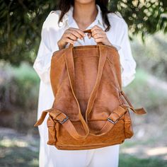 This stunning backpack is made of genuine soft nappa leather in a Honey Brown color. With enough room for all your daily essentials, It is perfect for everyday use, as well as for laptops of all sizes, IPAD, A4 files, books and travel. it as a unique structured with a zipper closure at the top, and three outside zipper pockets for mobile, keys, etc. It is fully lined with black strong cotton fabric which I divide to two large interior, zip pocket, and a leather cell phone pocket, shoulder strap Brown Faux Leather Standard Backpack, Brown Faux Leather Backpack For On-the-go, Everyday Leather Standard Backpack, Brown Softback Backpack For Daily Use, Leather Backpack For Everyday Use, Rectangular Soft Leather Backpack For On-the-go, Soft Leather Softback Backpack For On-the-go, Everyday Leather Softback Backpack With Adjustable Strap, Leather Softback Backpack With Adjustable Strap For Everyday