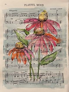 an old sheet music with flowers painted on it