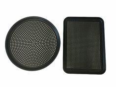 two black trays sitting next to each other