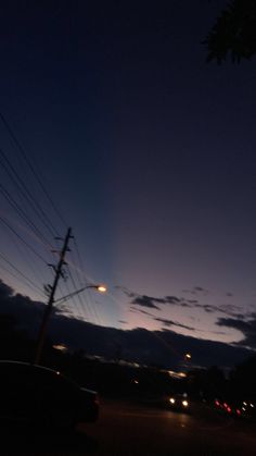 the night sky is lit up with street lights