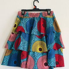 Women’s Skirt Tiered Skirt Ruffled Elasticized Waist Size - L Material Polyester - 100% Measurement Length - 22” Waist - 30” Hips - 92” The Skirt Is New With Tags Fitted Multicolor Tiered Mini Skirt, Multicolor Tiered Skort With Lined Skirt, Fitted Multicolor Ruffled Mini Skirt, Multicolor Relaxed Pencil Skirt, Multicolor Tiered Wrap Skirt With Lining, Flowy Multicolor Tiered Wrap Skirt, Multicolor Tiered Lined Wrap Skirt, Flowy Multicolor Lined Wrap Skirt, Multicolor Flowy Tiered Wrap Skirt