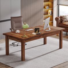 a wooden table sitting on top of a white rug next to a brown leather chair