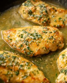 some chicken is cooking in a pan with broccoli sprinkled on it