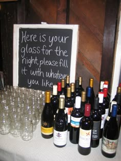 there is a sign that says here is your glass for the night, please fill it with whatever you like