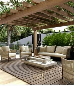 an outdoor living area with couches and chairs