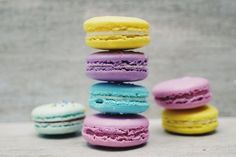 a stack of colorful macaroons sitting on top of each other with the words cro 101 underneath it