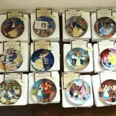 there are many plates with disney characters on them