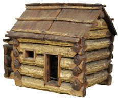 a small log house made out of logs