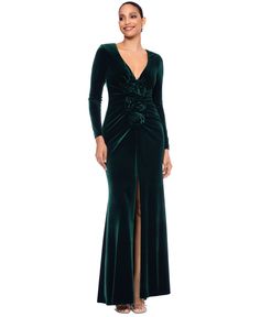 a woman wearing a green velvet dress