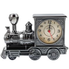 a clock that is on top of a toy train with the time at 11 00