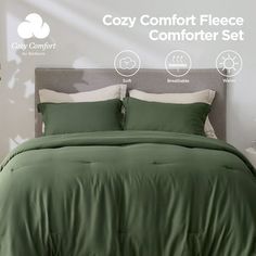 the comforter set is green and has white sheets on it, along with two pillows