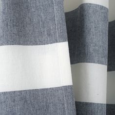 the fabric is striped in white and blue