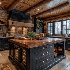 a large kitchen with an island in the middle