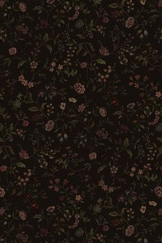 a black background with flowers and leaves on it