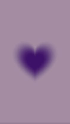 a purple heart is shown in the middle of an image with a shadow on it