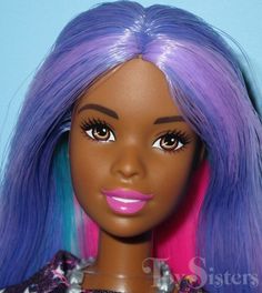 a close up of a doll with purple hair and pink lipstick on her lips, wearing a dress