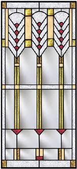 a stained glass window with gold trim and red accents on the bottom, in an ornate pattern