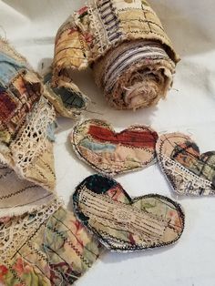 several pieces of fabric with hearts on them