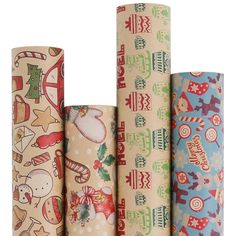 several rolls of wrapping paper with christmas designs on them