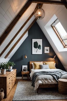 a bed sitting under a window in a bedroom next to a wooden dresser and chest of drawers